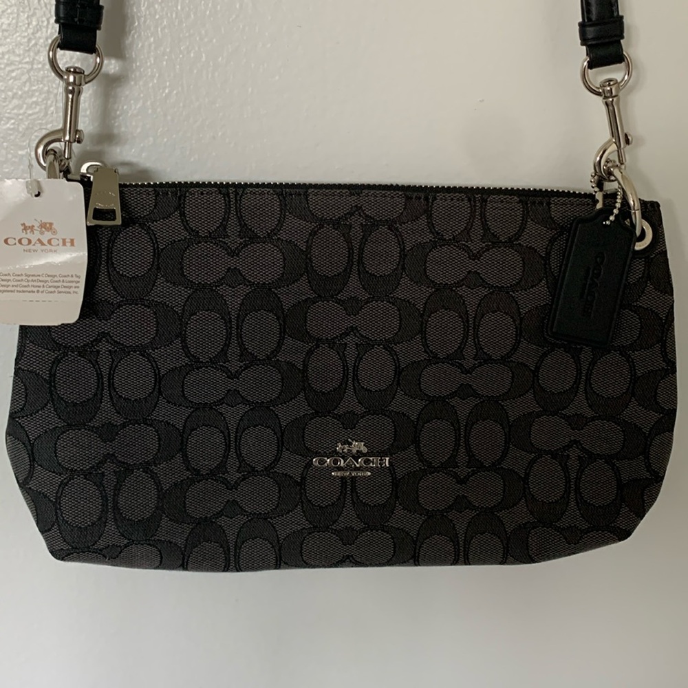 Coach Signature Charley crossbody bag. New